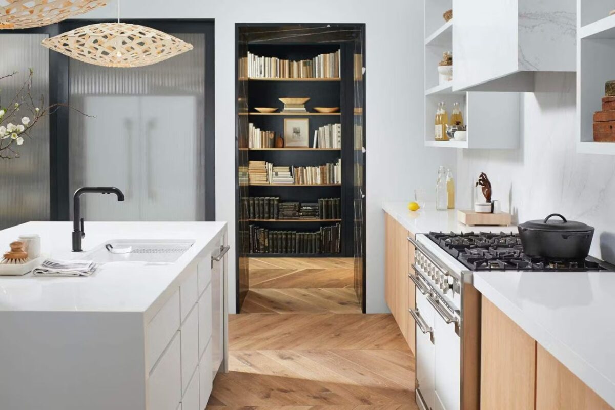 A modern kitchen design featuring a Cosentino stone countertop, offering both elegance and lasting durability