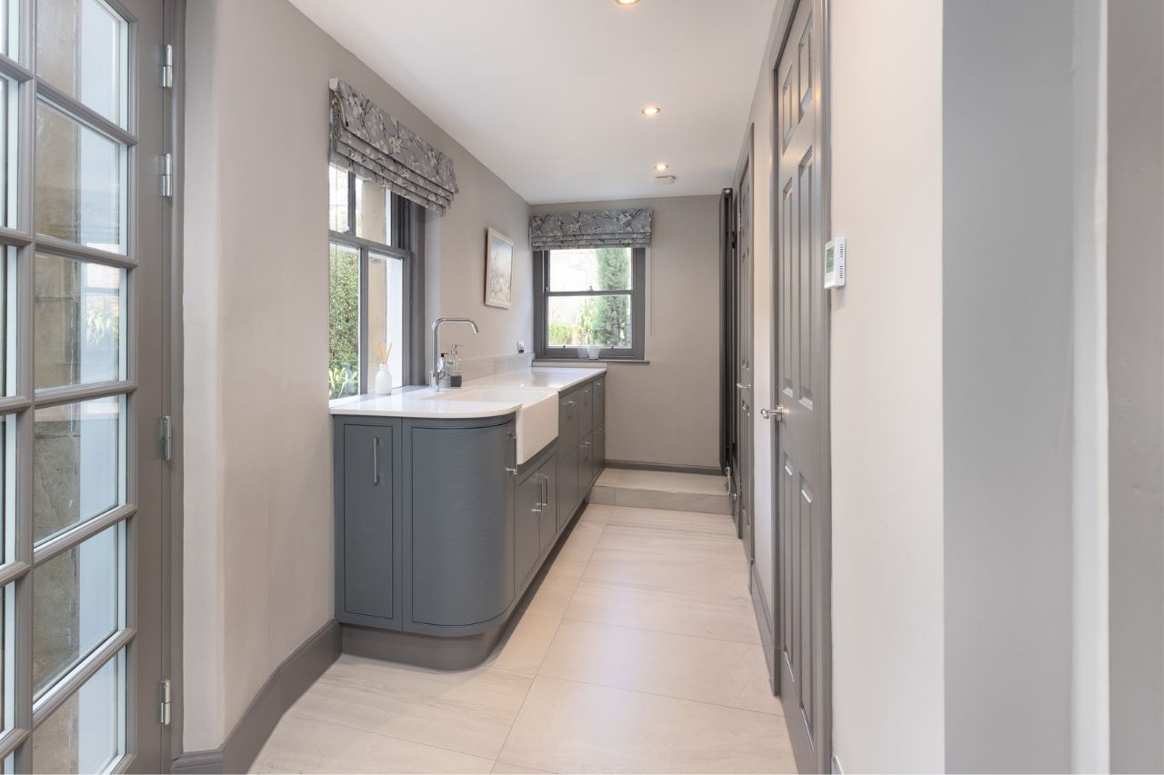 Utility room installation with a separate boiler room and laundry room.