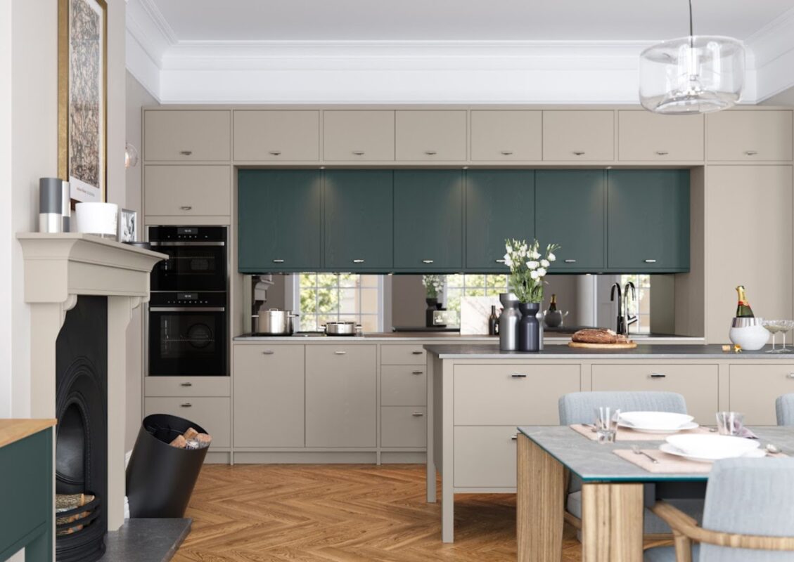 A modern kitchen renovation featuring base and wall units with integrated appliances, complemented by a kitchen island and a dining area.