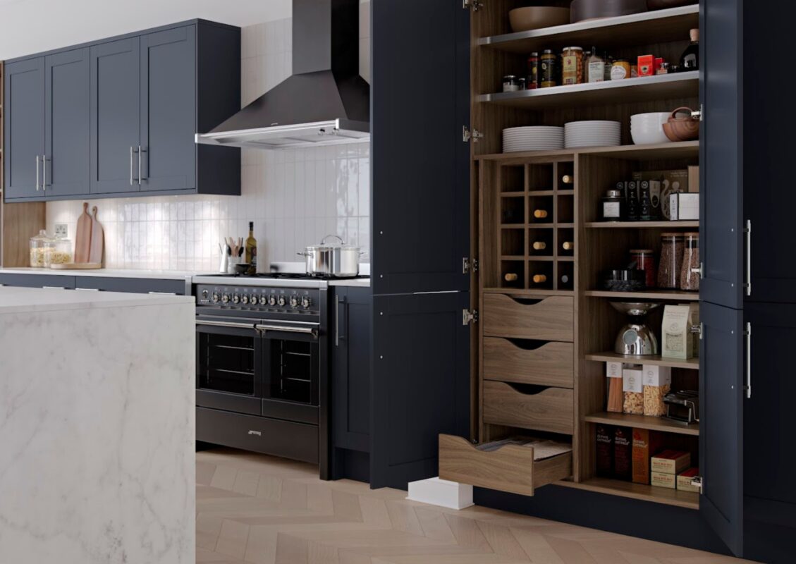 A modern kitchen renovation with a tall unit with shelves and dividers, designed to function as a pantry.